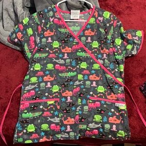 Selling a medium women’s scrub top